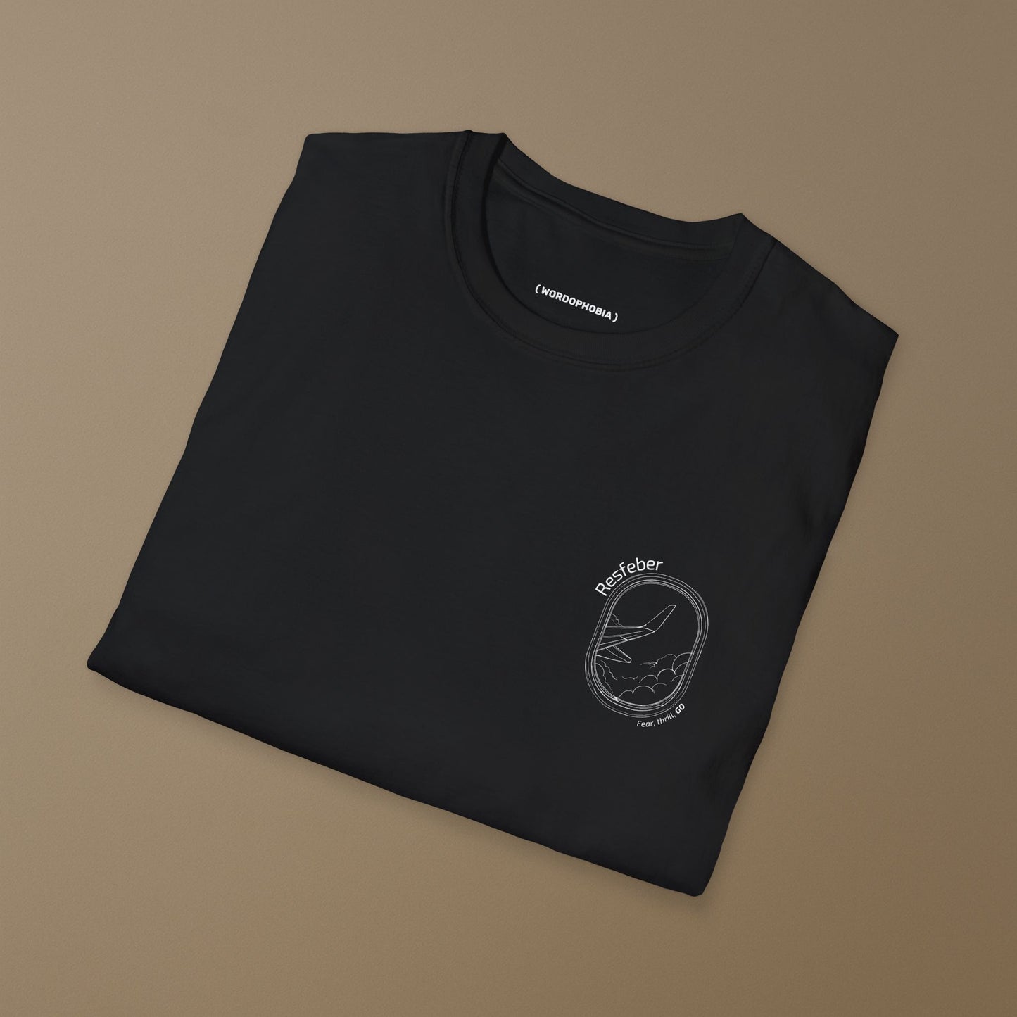 Minimalist folded t-shirt with the Swedish word “Resfeber” on the front. Cotton tee for travel lovers. Unisex fit, black or white.