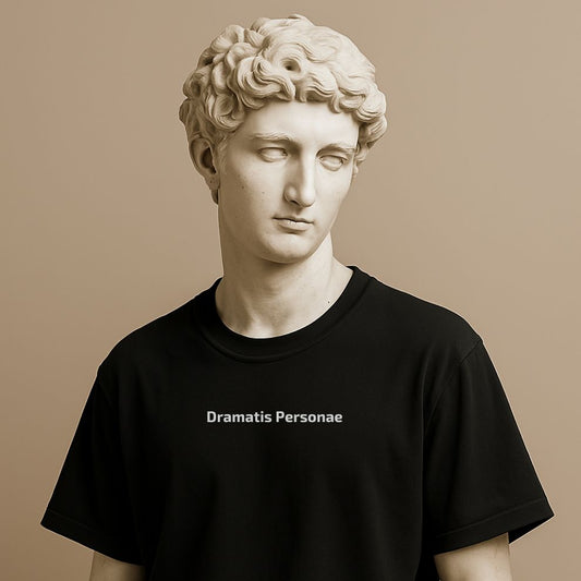 Statue wearing a black t-shirt with text Dramatis Personae on a beige background