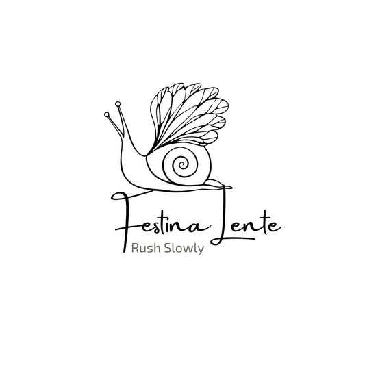 Enlarged design of unisex minimalist cotton t-shirt with the Latin phrase “Festina Lente” in white color