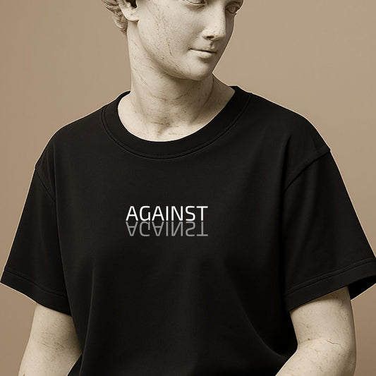 Roman statue wearing a black t-shirt with the word Against mirrored in clean typography for a modern design.
