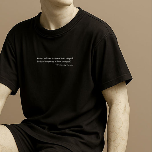 Minimalist black t-shirt with Dostoevsky-inspired quote on the Roman statue