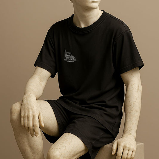 Minimalist unisex t-shirt with the word “Tsundoku” on the statue. Japanese term for buying more books than you read. Cotton tee in black or white.