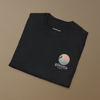 Minimalist folded t-shirt with Swedish word Gökotta in black cotton 