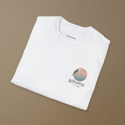 Minimalist folded t-shirt with Swedish word Gökotta in white cotton 