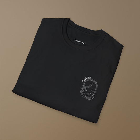 Minimalist folded t-shirt with the Swedish word “Resfeber” on the front. Cotton tee for travel lovers. Unisex fit, black or white.