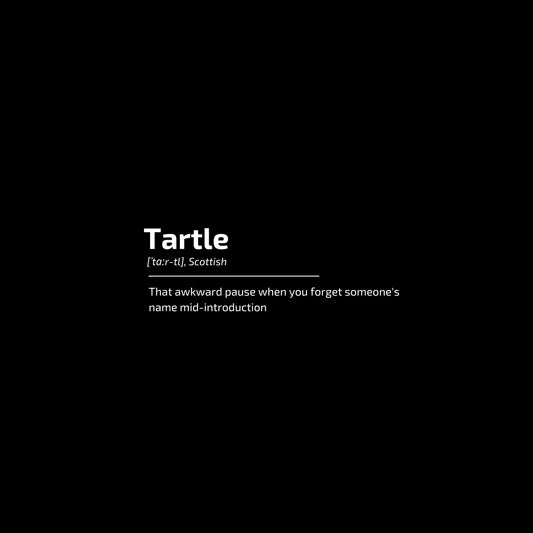 Enlarged design of unisex minimalist t-shirt with the word “Tartle” 