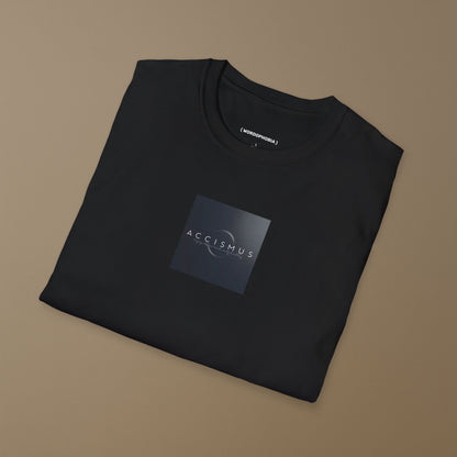 Folded black t-shirt with a design of the word “Accismus” and definition “Feigning indifference toward a secretly desired thing” on a beige background