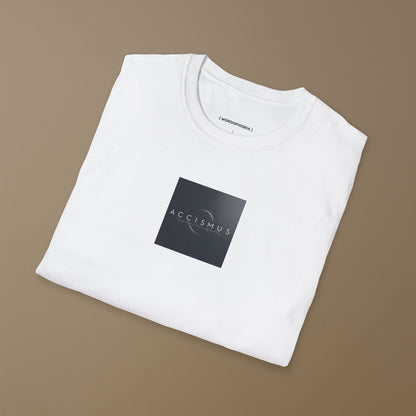 Folded white t-shirt with a design of the word “Accismus” and definition “Feigning indifference toward a secretly desired thing” on a beige background