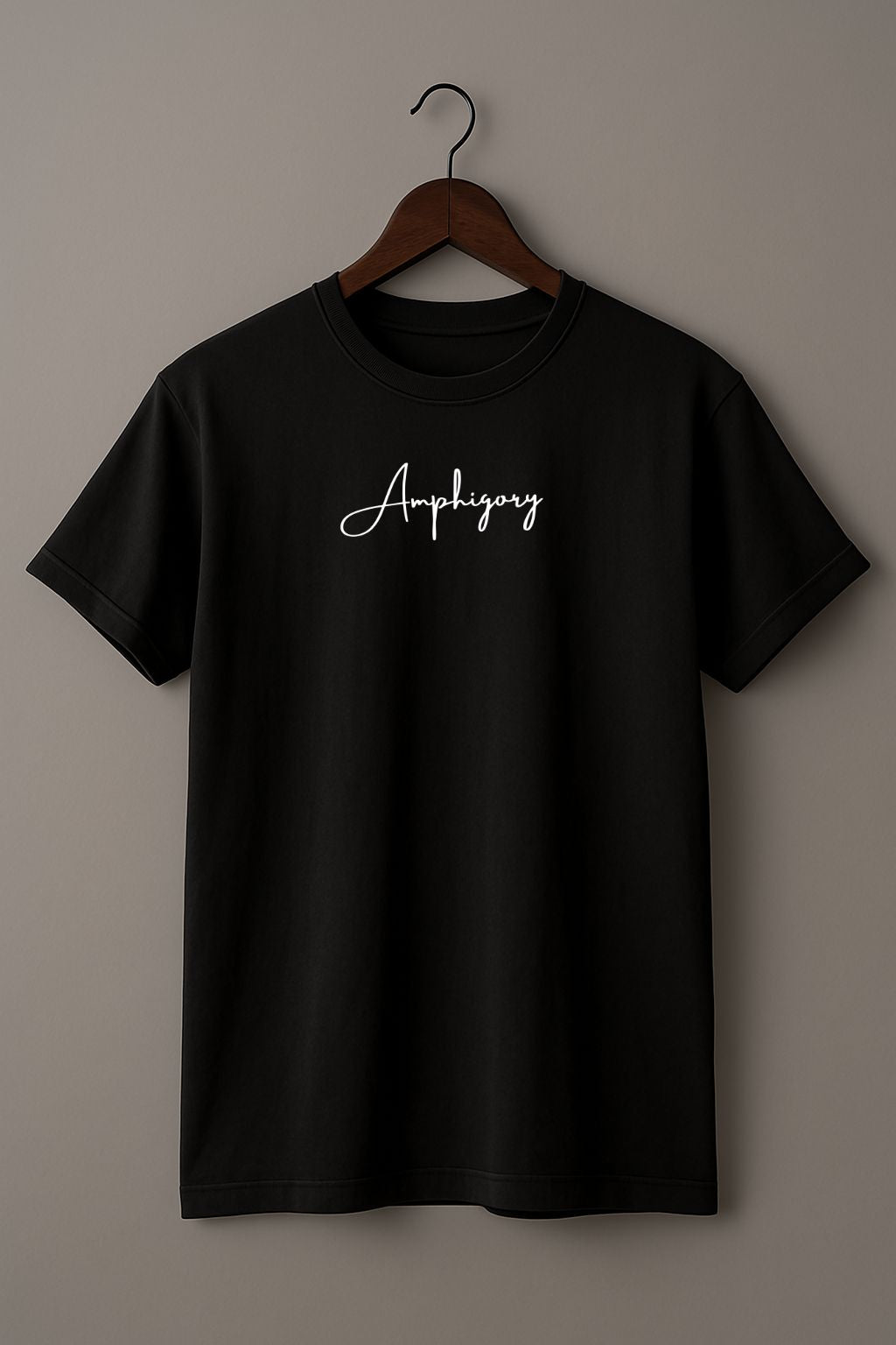 Black t-shirt with 'Amphigory' text (front side)  on a wooden hanger against a plain background