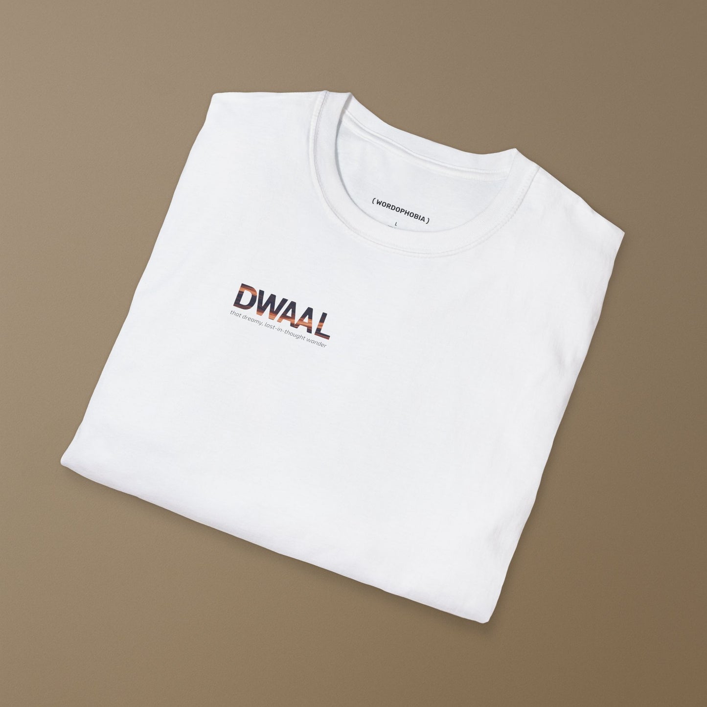 Folded white t-shirt with 'DWaal' logo on a brown background