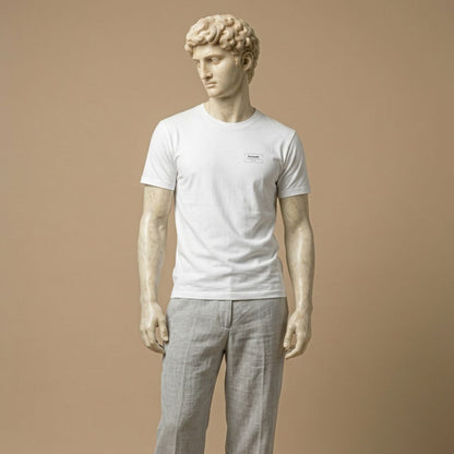 Roman statue wearing white t-shirt with graphic design of the word "Fernweh" and phrase "The longing for distant Places"
