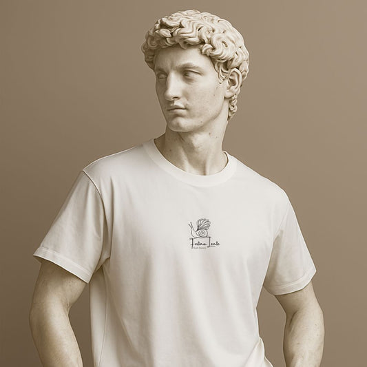 Unisex t-shirt with the Latin phrase “Festina Lente” on the statue. Minimalist cotton tee in white. Elegant reminder to move wisely.