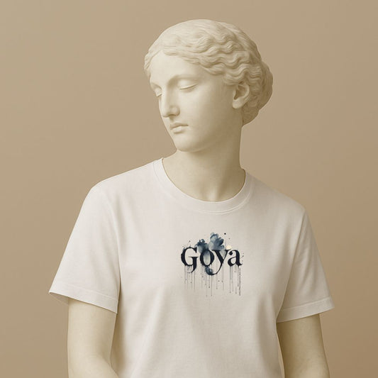 Statue wearing a white t-shirt with 'Goya' design on a beige background