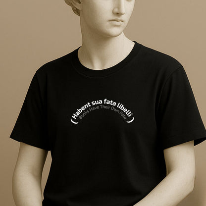 Statue wearing a black t-shirt with white typographic design with latin phrase 'Habent sua fata libelli' and its translation "Books Have Their Own Fate"  on a beige background