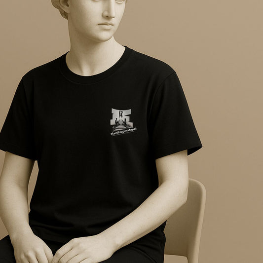 Statue wearing a black t-shirt with a graphic design and word "Mamihlapinatapei" on a beige background