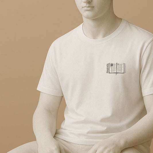 Statue wearing a white t-shirt with a small graphic of open old book with text "Marginalia" and "Where the real ideas live" on a beige background