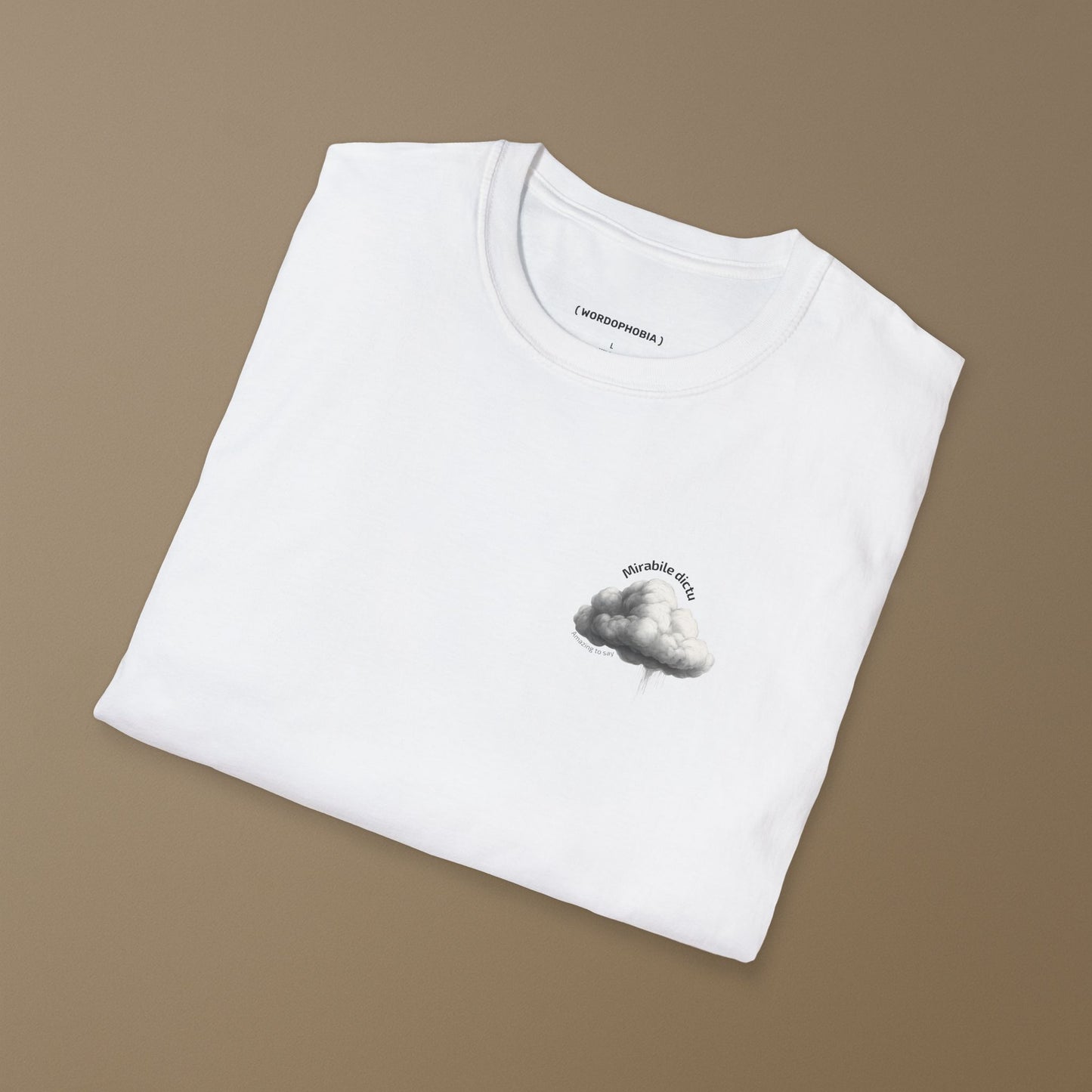 Folded white t-shirt  with the design of the cloud with 'Mirabile dictu' and 'Amazing to say' text on a beige background