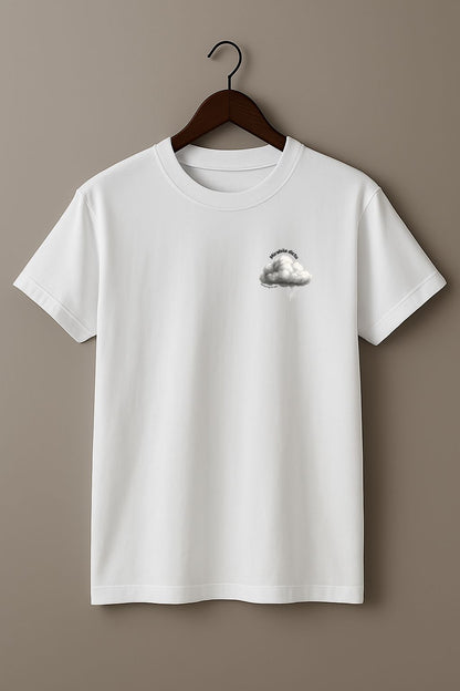 White t-shirt with a white cloud design and 'Mirabile dictu' and 'Amazing to say' text on a wooden hanger against a beige wall
