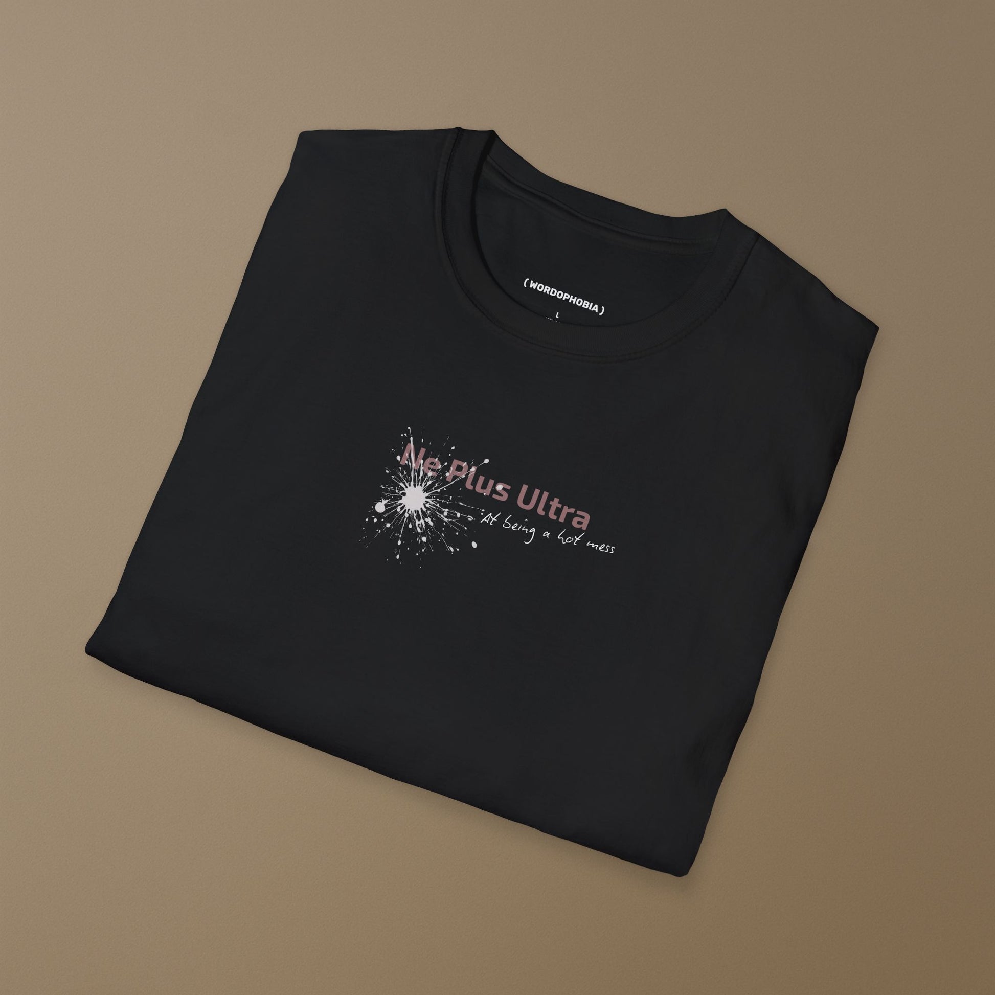 Folded minimalist black T-shirt with Latin phrase Ne Plus Ultra at Being a Lot Mess