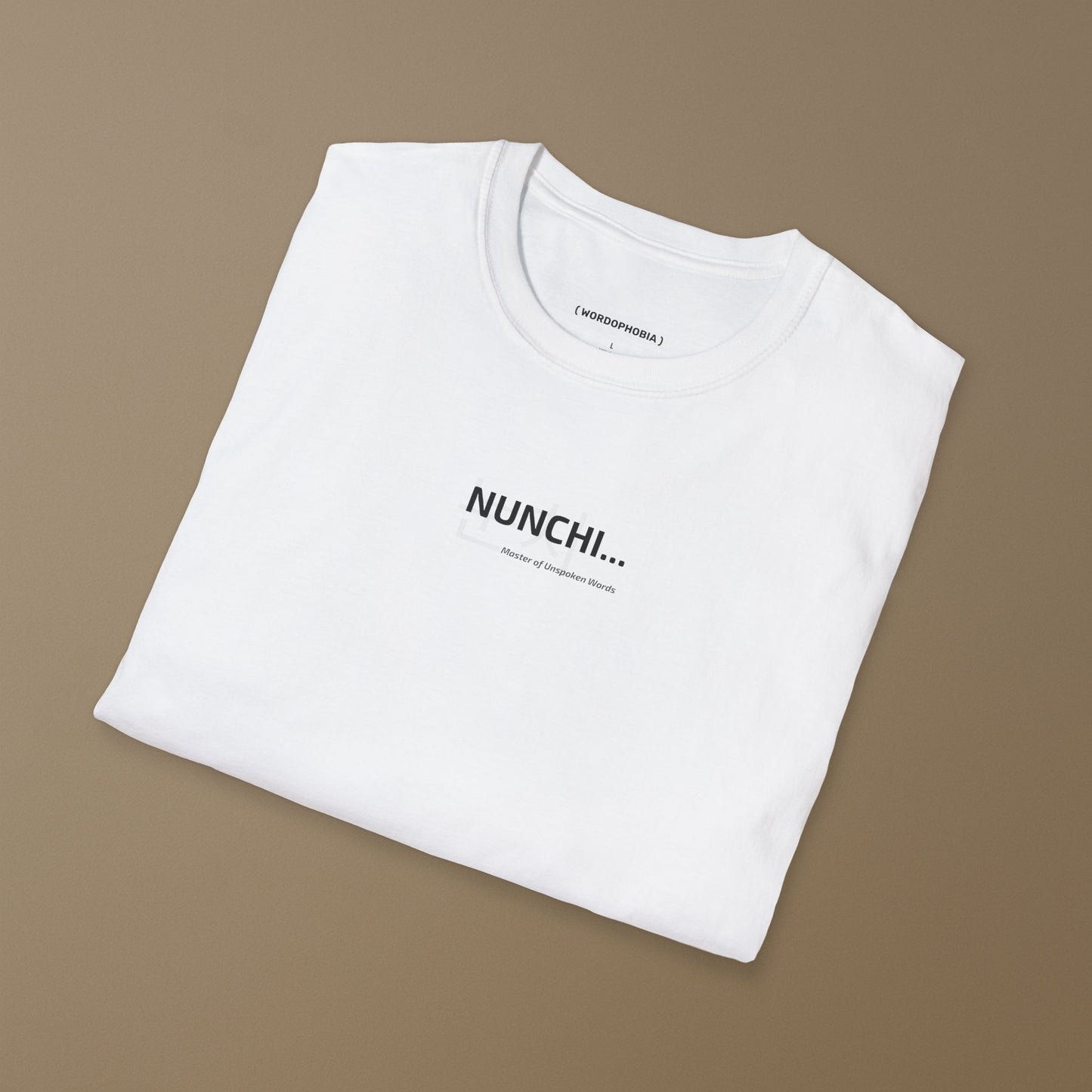 Folded white t-shirt with design “Nunchi,” hieroglyph and the phrase “Master of Unspoken Words” on a beige background