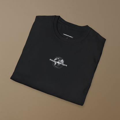 Folded black t-shirt with the phrase "Philomathean Spirit" and the globe behind it  on a plain background