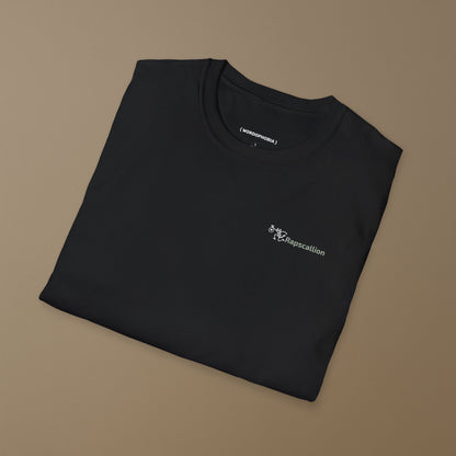 Folded black t-shirt with 'Rapscallion' word with a stylized character on a beige background