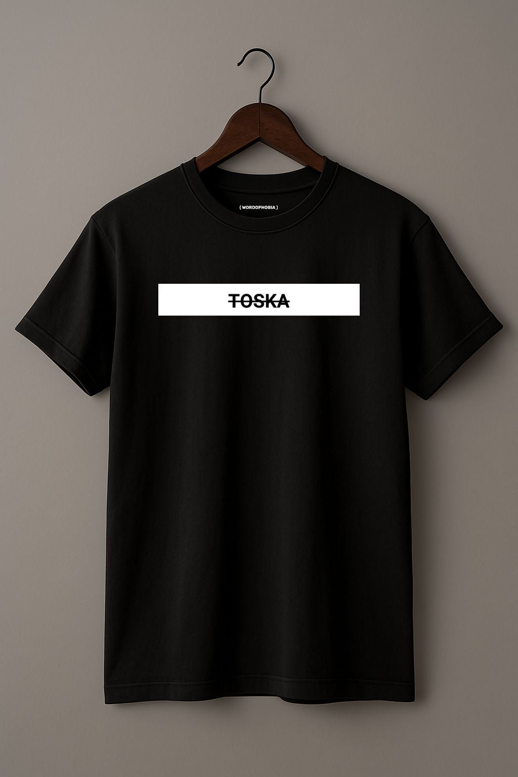Mockup of unisex minimalist t-shirt with the rare word “Toska” in soft black cotton