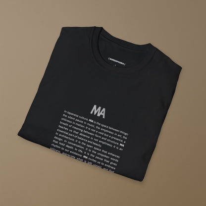 Folded black t-shirt with white text Ma and its concept on a beige background
