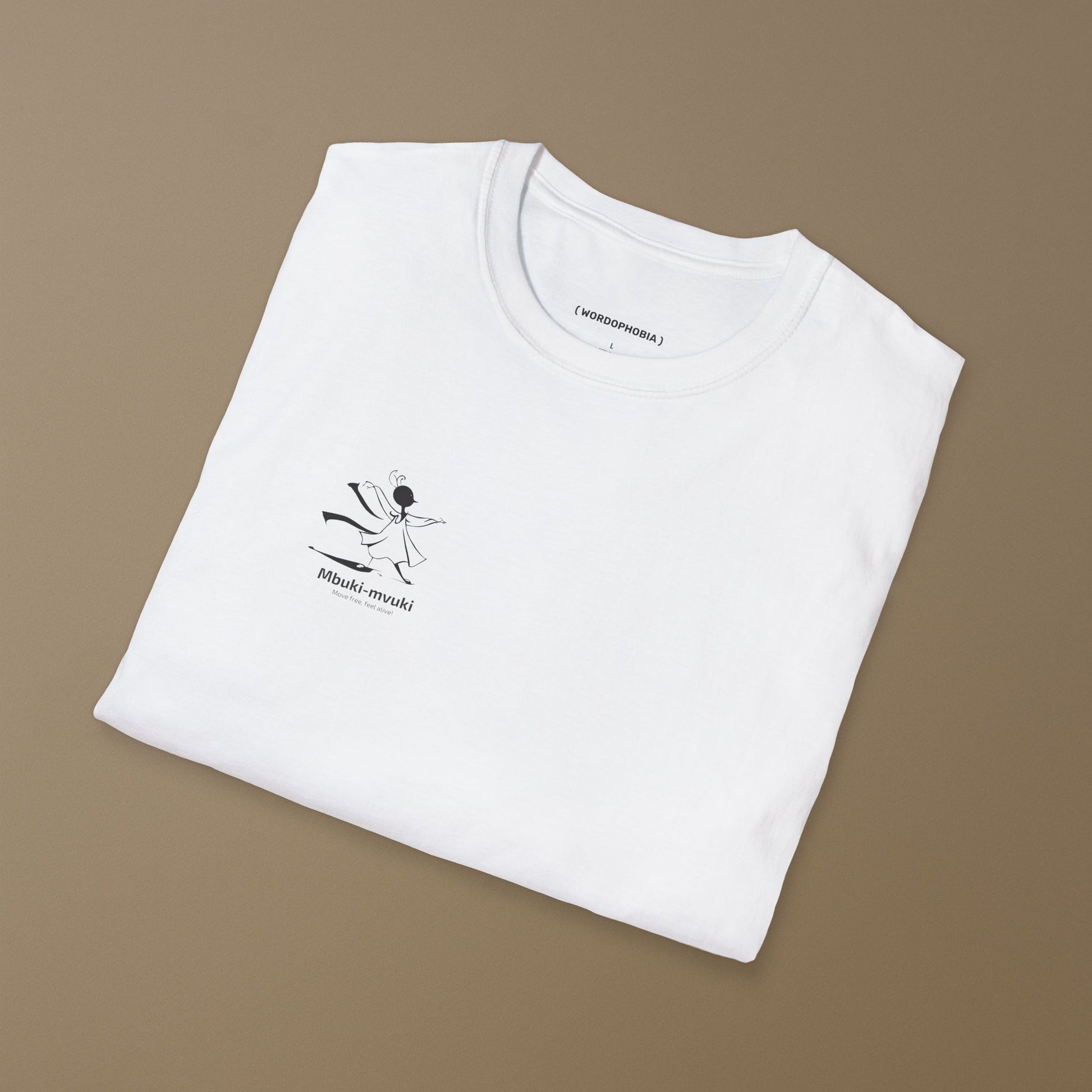 Folded white t-shirt with the African word Mbuki-mvuki and a tiny fantasy dancing mascot graphic on a brown background