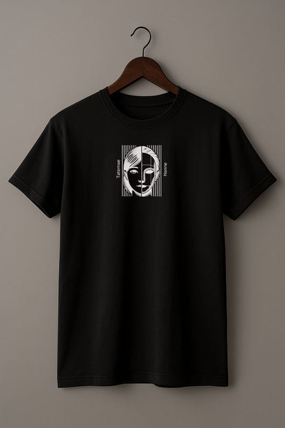 Black t-shirt with a graphic design of a face with 'Tatemae' and 'Honne' text on a hanger against a beige background